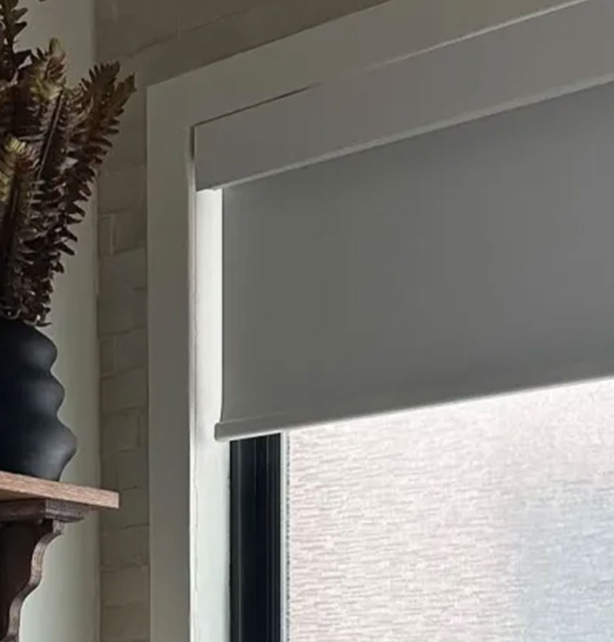 Image of person measuring a window