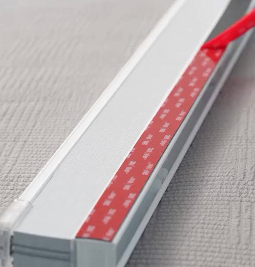 Image of person measuring a window