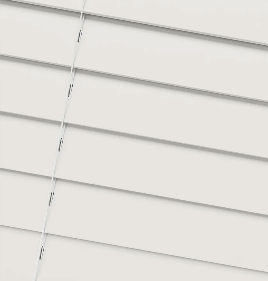 Image of person measuring a window