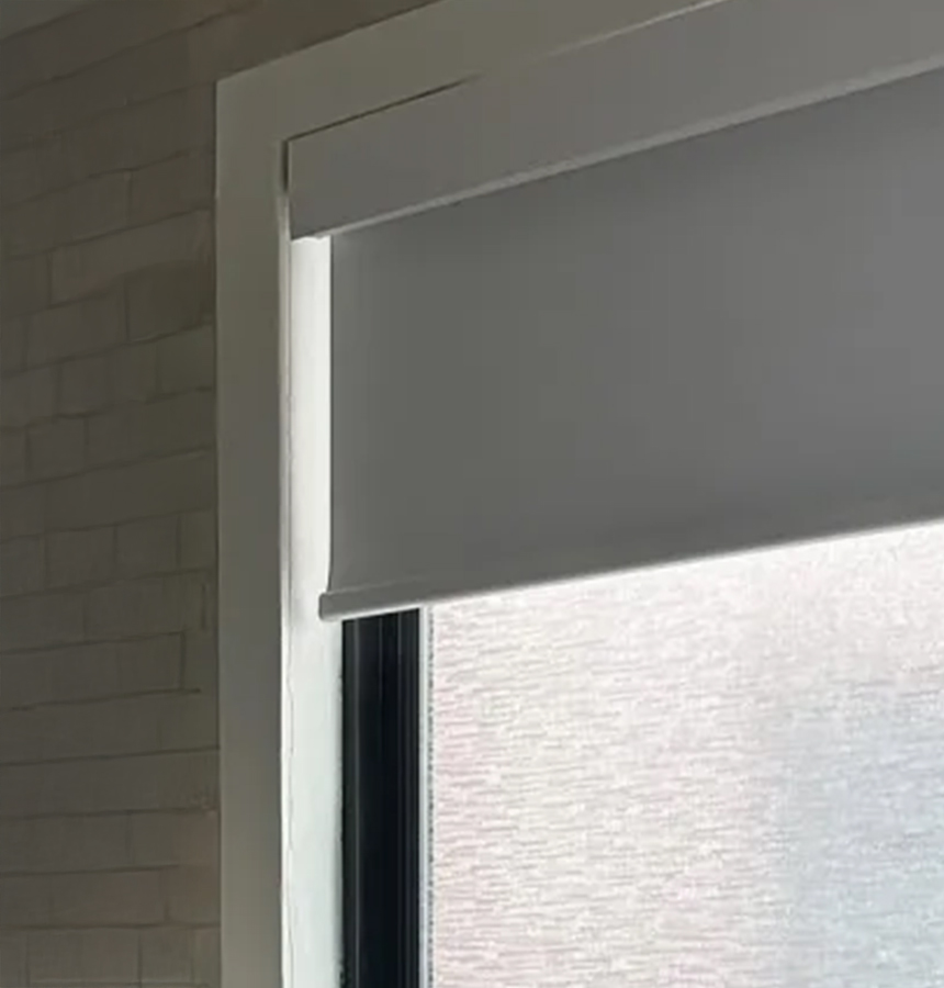 Image of person measuring a window