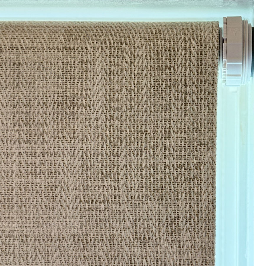 Image of person measuring a window