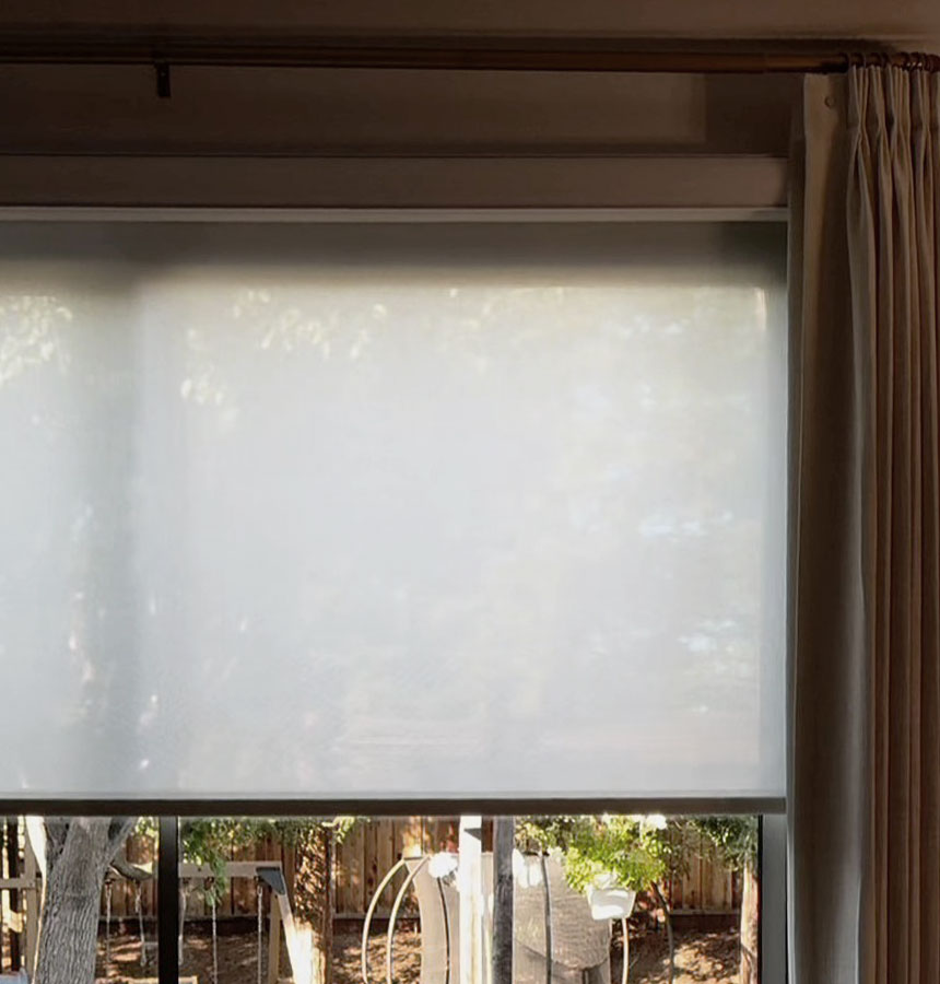 Image of person measuring a window